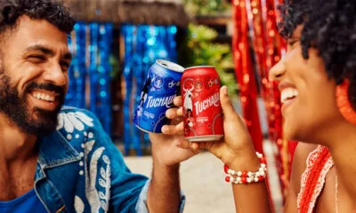 Latas comemorativas do Guaraná Tuchaua para o Festival de Parintins 2025 com grafismos indígenas
