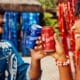 Latas comemorativas do Guaraná Tuchaua para o Festival de Parintins 2025 com grafismos indígenas