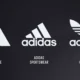 história da logo da Adidas com três listras, trefoil e logotipo de montanha